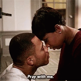 a man and a woman are kissing and the woman is saying pray with me .